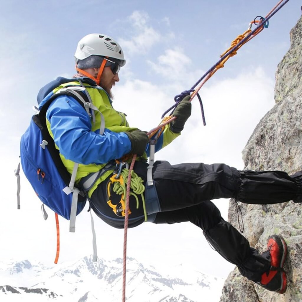An individual ascending a rock face with paracord, what is polyester rope.